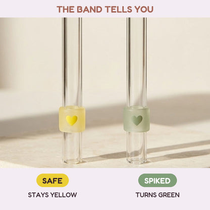 Straw band stays yellow when safe and turns green when spiked